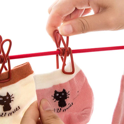 &nbsp;Corde à linge élastique avec 12 pinces – L’alliée parfaite des foyers marocains cet hiver !